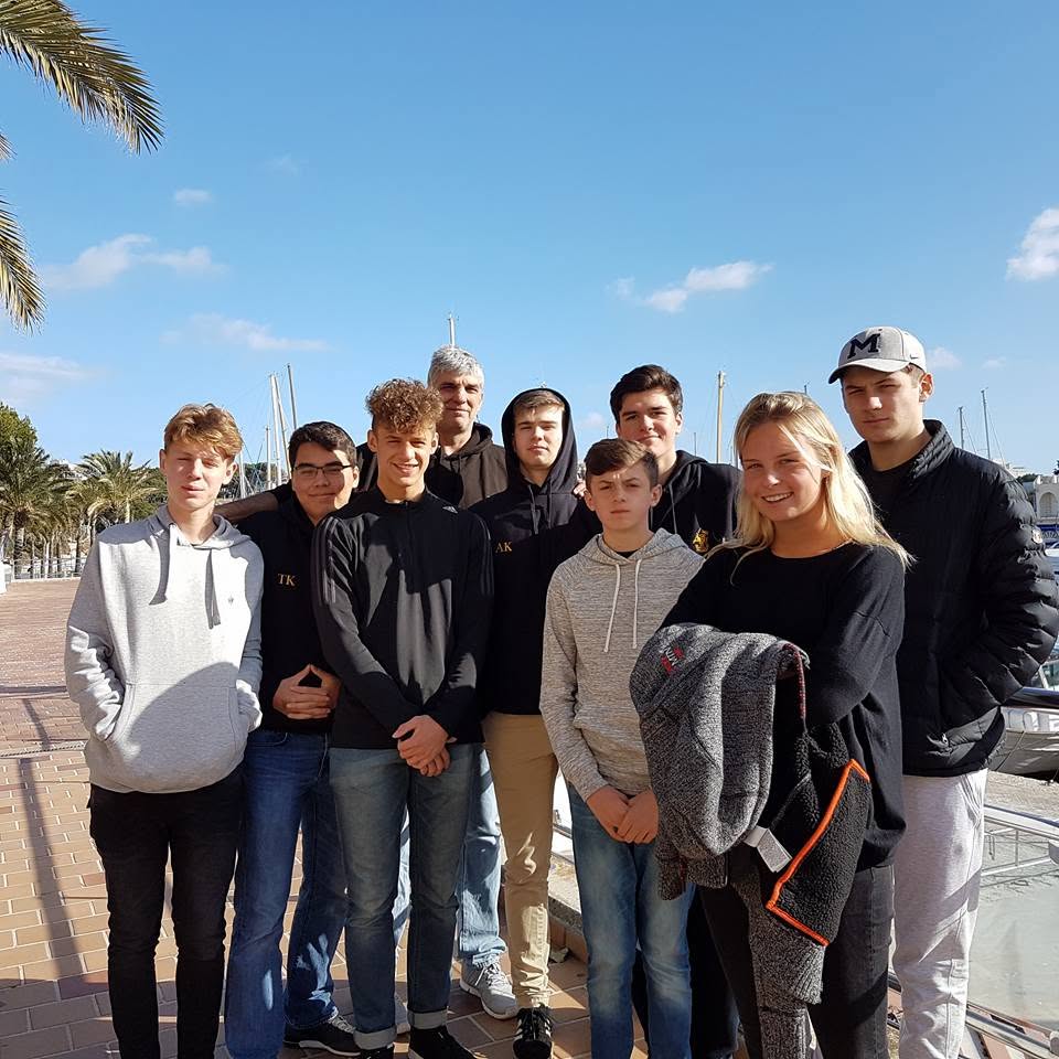 Team group photo at the Mallorca marina