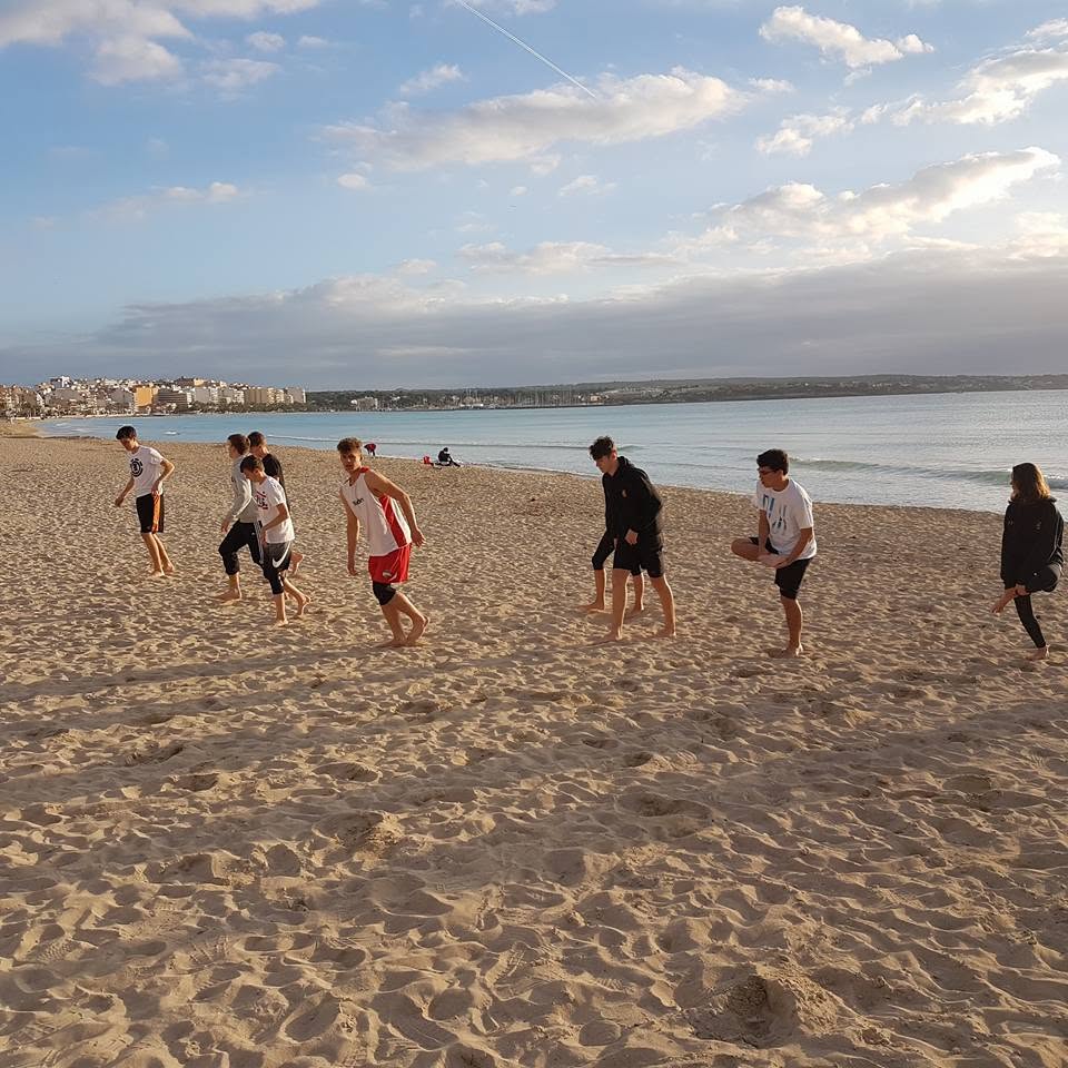 Players warming up on the beach in Mallorca