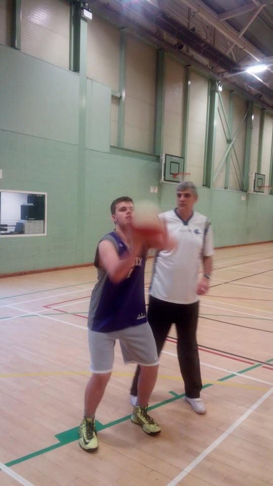 Player working on shooting form with Diego Maggi coaching